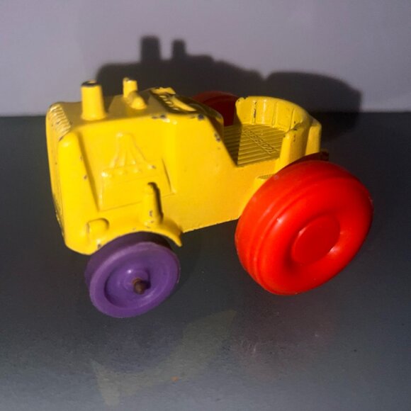 Vintage 1967‎ Tootsietoy Diecast Yellow Tractor with Orange & Purple Tires (No) - Picture 1 of 6
